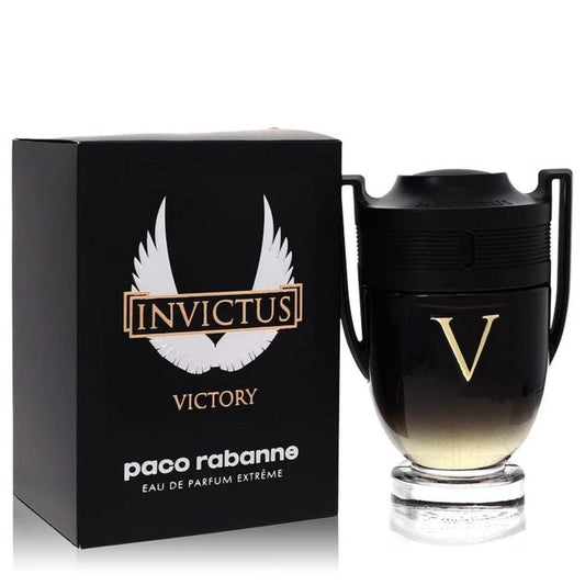 Invictus Victory bottle with box on a plain background
