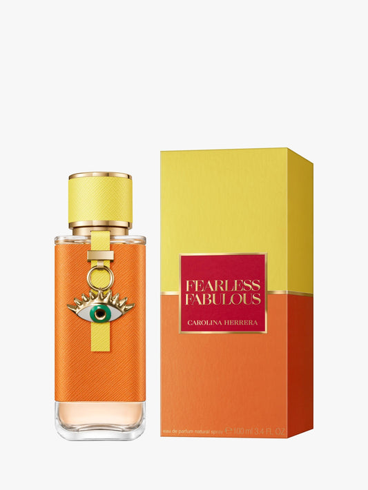 Carolina Herrera Fearless Fabulous bottle with box on a plain background
