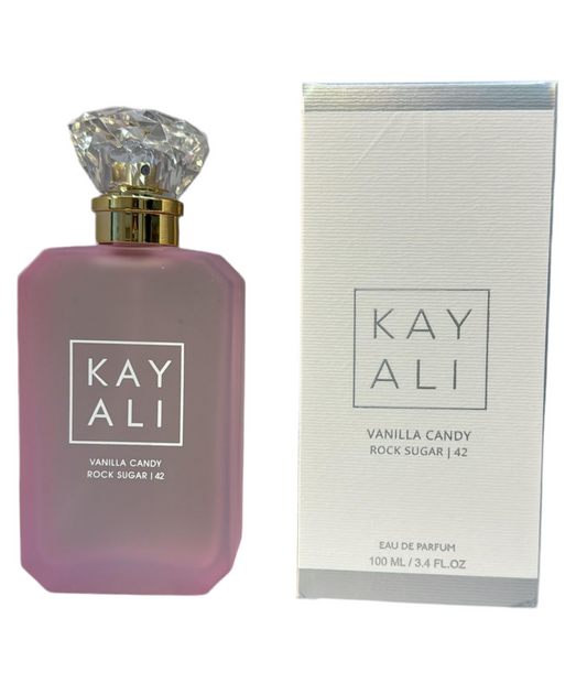 Bottle of Kayali Vanilla Candy Rock Sugar | 42 shown next to its packaging