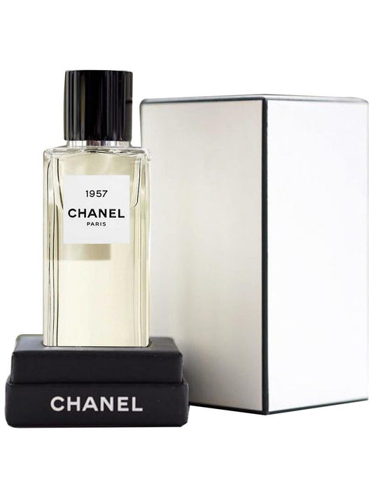 Chanel 1957 bottle photographed beside its box