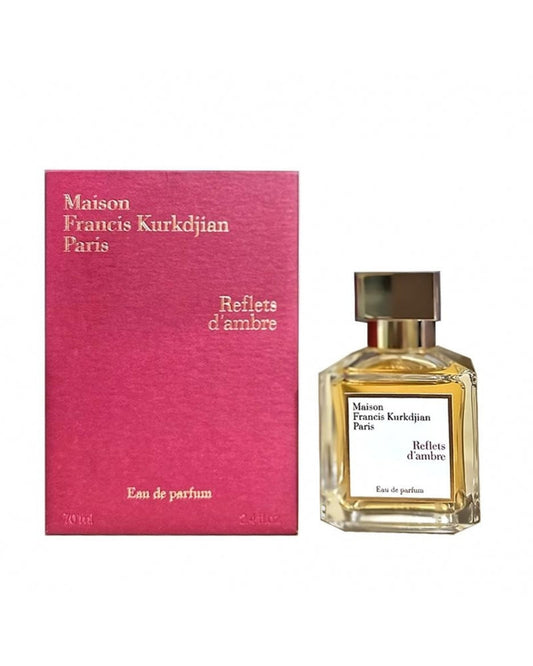 Bottle of Reflets d'Ambre By Maison Francis Kurkdjian shown next to its packaging