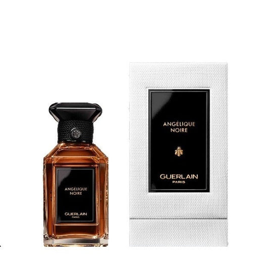Bottle of Guerlain Angélique Noire shown next to its packaging