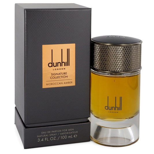 Dunhill Moroccan Amber bottle with box on a plain background
