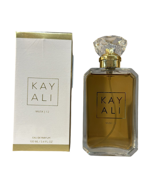 Bottle of Kayali Musk 12 shown next to its packaging