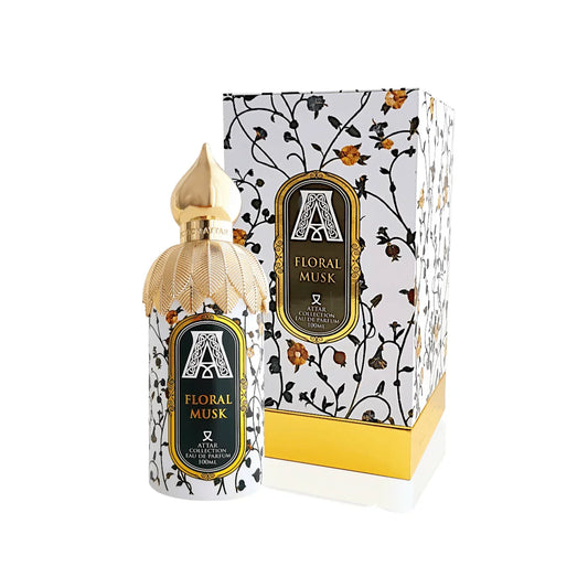 Attar Collection Floral Musk bottle with box on a plain background