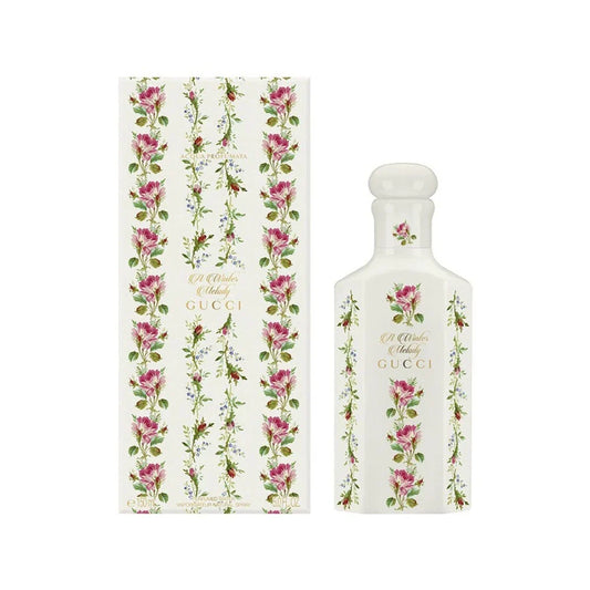 Gucci A Winter Melody bottle photographed beside its box