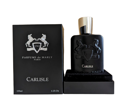 Bottle of Carlisle By Parfums de Marly shown next to its packaging