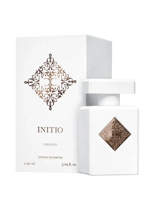 Initio Paragon bottle photographed beside its box