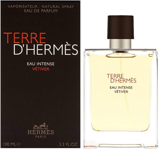 Bottle of Hermès Terre d'Hermès Eau Intense Vétiver shown next to its packaging