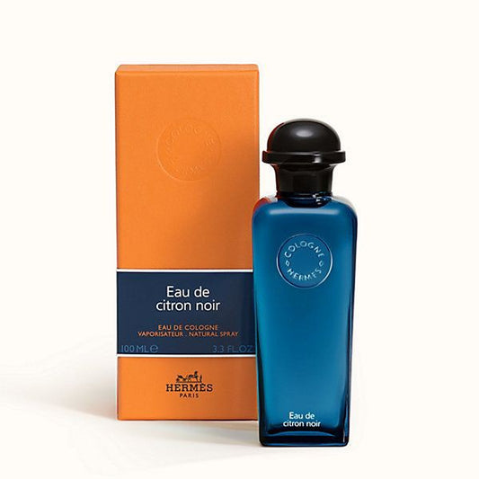 Hermès Eau de Citron Noir bottle photographed beside its box
