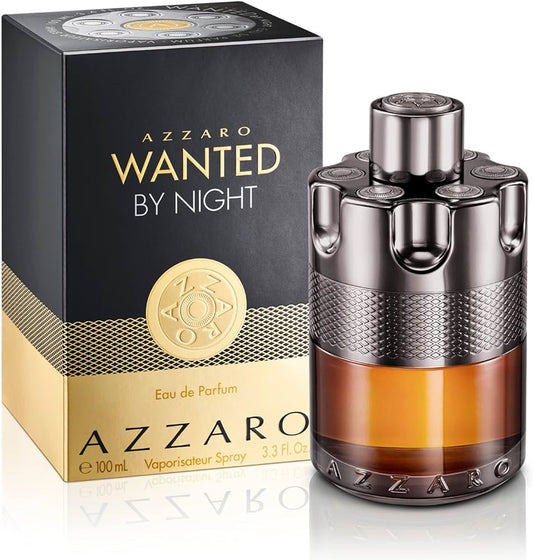 Bottle of Azzaro Wanted by Night shown next to its packaging
