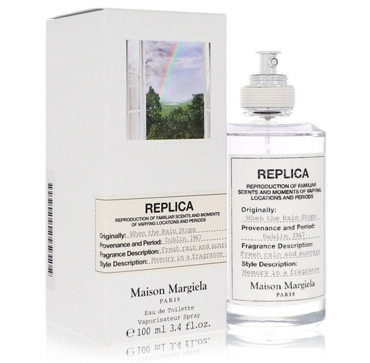 When the Rain Stops By Maison Margiela bottle with box on a plain background