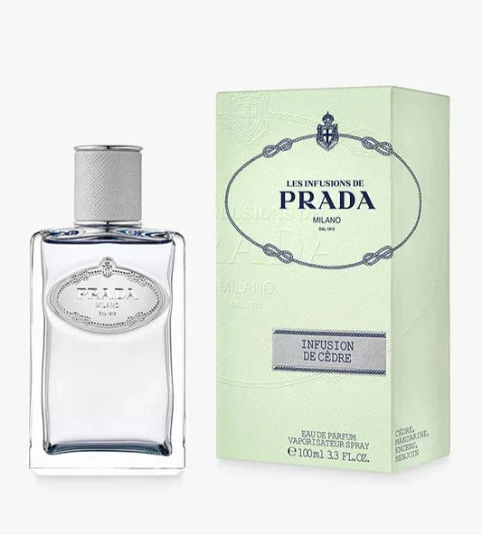 Bottle of Infusion De Cèdre By Prada shown next to its packaging