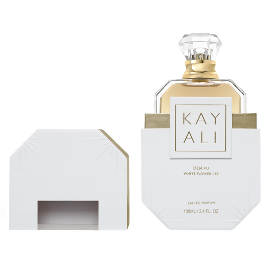 Kayali Déjà Vu White Flower 57 bottle with box on a plain background