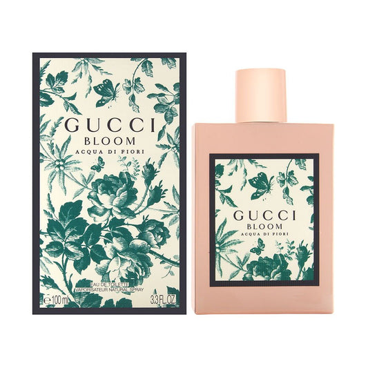 Gucci Bloom Acqua di Fiori bottle with box on a plain background