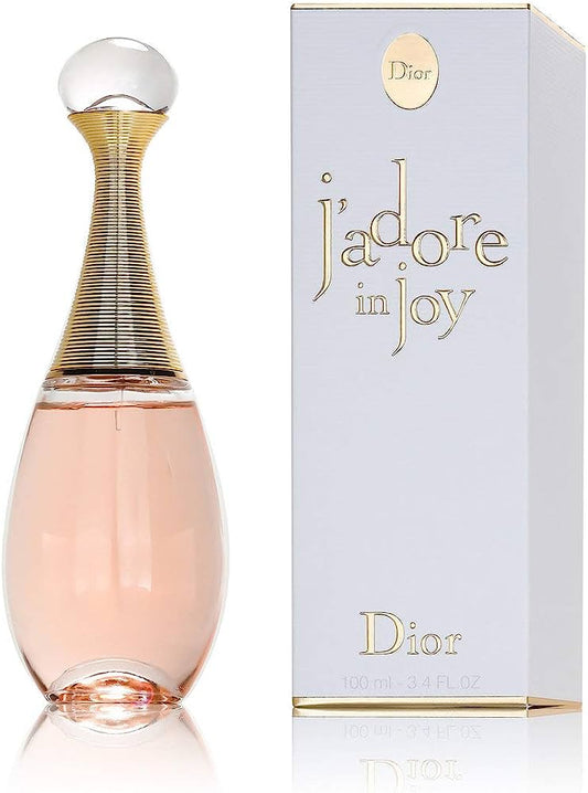 J'adore In Joy bottle photographed beside its box