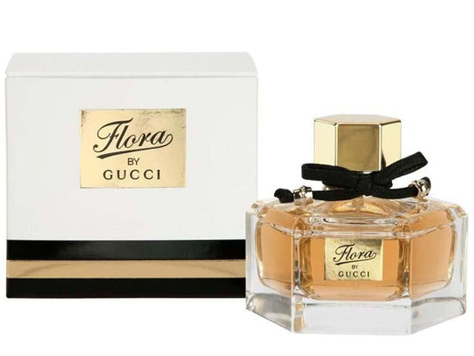 Bottle of Gucci Flora shown next to its packaging