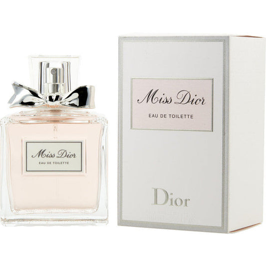 Miss Dior Eau de Toilette bottle with box on a plain background