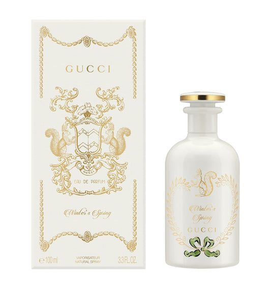 Gucci Winter's Spring bottle with box on a plain background