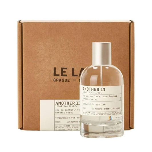 Bottle of Another 13 Eau de Parfum shown next to its packaging