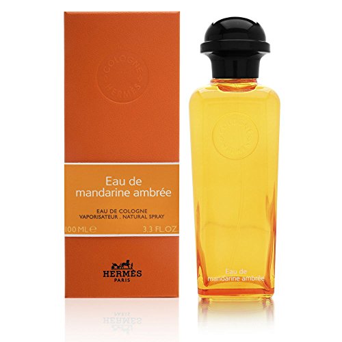 Hermès Eau de Mandarine Ambrée bottle with box on a plain background