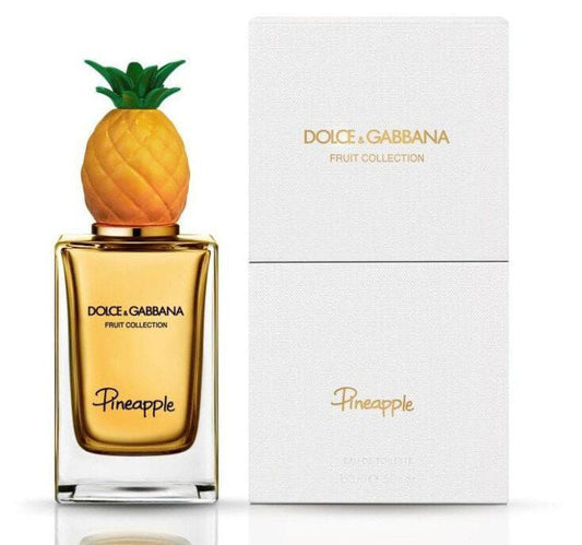 Bottle of Dolce & Gabbana Pineapple shown next to its packaging
