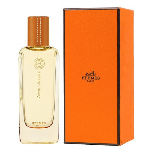 Hermès Ambre Narguilé bottle with box on a plain background