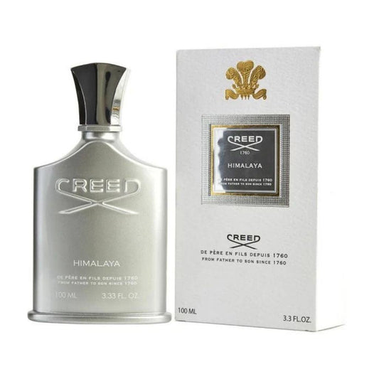 Bottle of Creed Himalaya shown next to its packaging