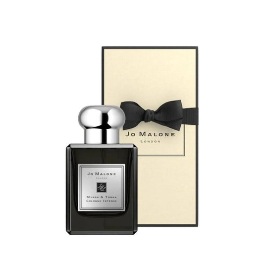 Bottle of Jo Malone Myrrh & Tonka Cologne Intense Eau de Cologne shown next to its packaging