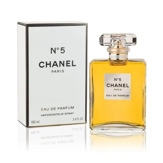 Chanel N°5 Eau de Parfum bottle with box on a plain background