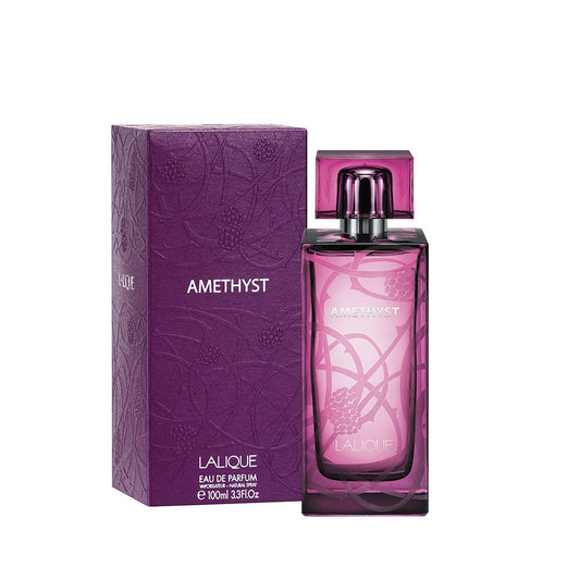 Amethyst Lalique bottle with box on a plain background