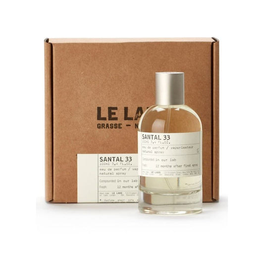 Bottle of Santal 33 Eau de Parfum shown next to its packaging