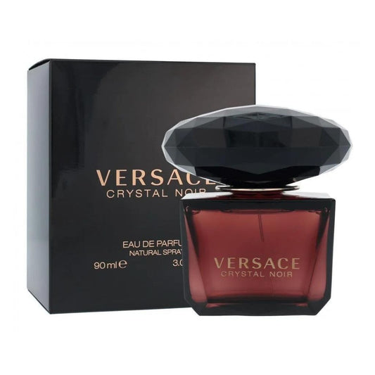 Crystal Noir Eau de Parfum bottle photographed beside its box